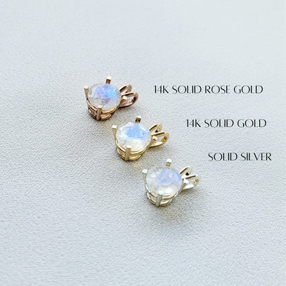 Three moonstone pendants with different metal settings: 14k solid rose gold, 14k solid gold, and solid silver.