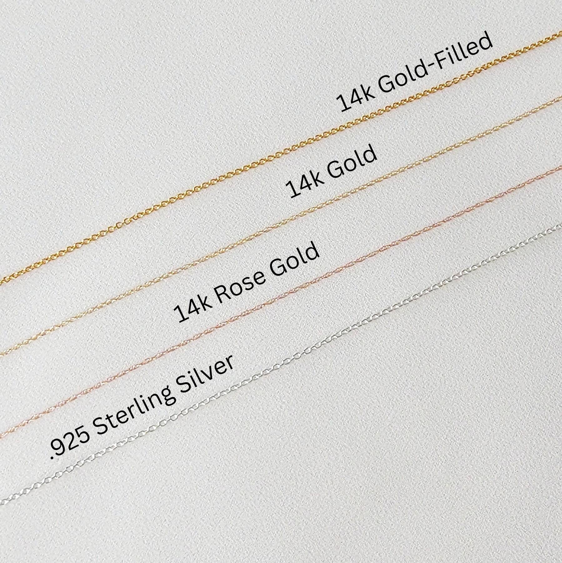 Four different chain necklaces in various metal finishes: .925 Sterling Silver, 14k Rose Gold, 14k Gold, and 14k Gold-Filled.