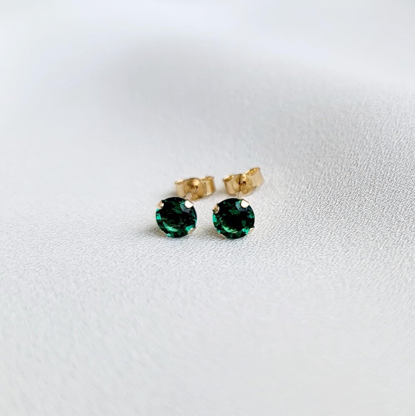 Sustainable lab-created emerald stud earrings in 14k solid gold, gold filled, or sterling silver — available in white, yellow, or rose gold and sizes 3mm, 4mm, 5mm, 6mm — eco-friendly gemstone earrings and ethical jewelry gift.