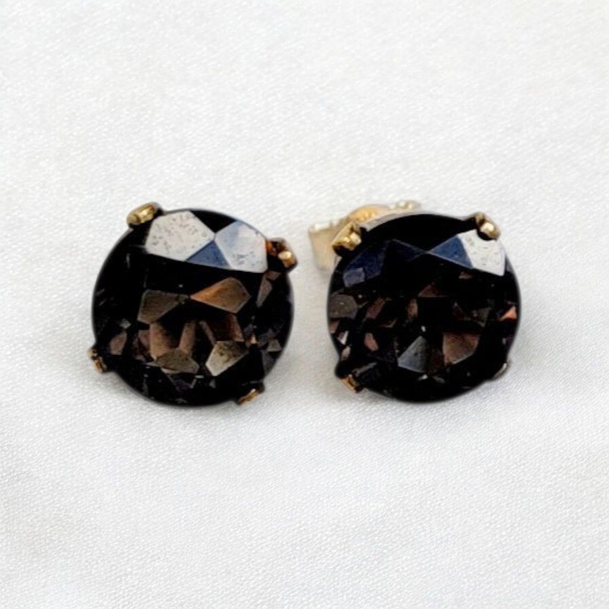 Smoky quartz stud earrings in 14k gold, gold filled, or sterling silver — available in 3mm, 4mm, 5mm, and 6mm sizes.