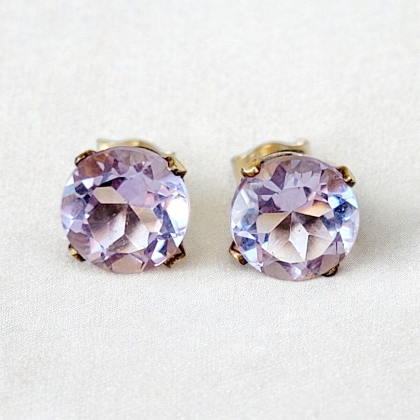 Pink amethyst stud earrings in 14k solid gold, gold filled, or sterling silver, available in 6mm, 5mm, 4mm, and 3mm sizes.
