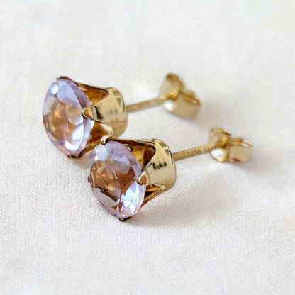 Pink amethyst stud earrings in 14k solid gold, gold filled, or sterling silver, available in 6mm, 5mm, 4mm, and 3mm sizes.