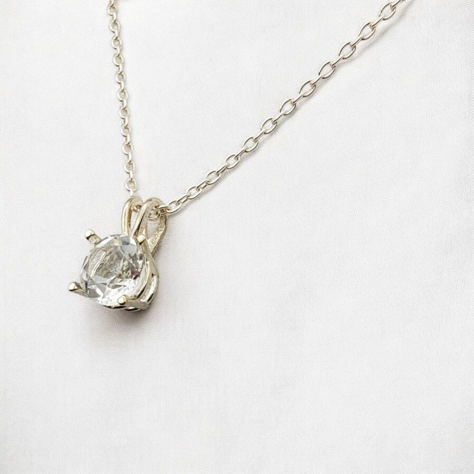 White topaz pendant necklace in 14k gold or sterling silver, available in 6mm–3mm with 16 or 18 inch chain.