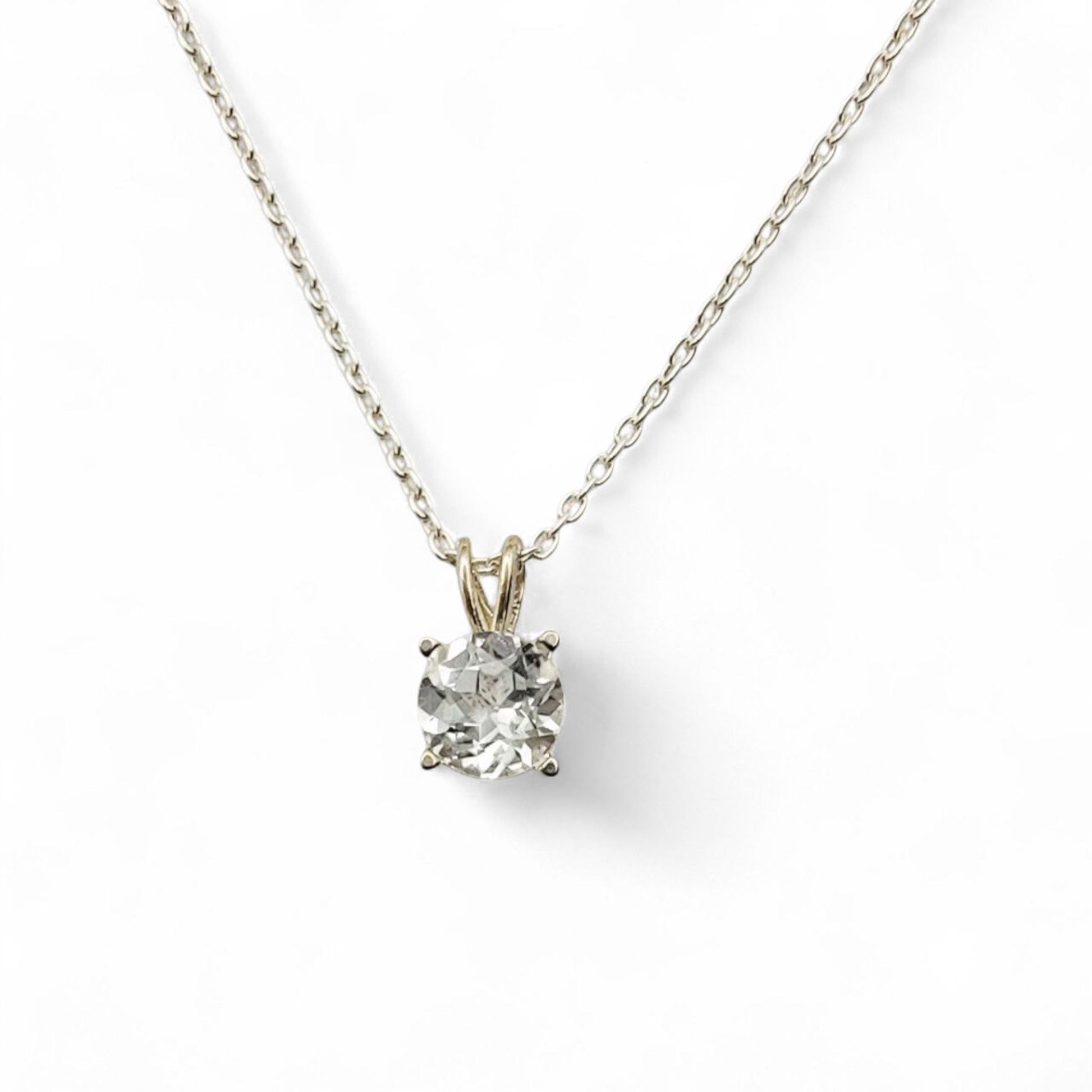 White topaz pendant necklace in 14k gold or sterling silver, available in 6mm–3mm with 16 or 18 inch chain.