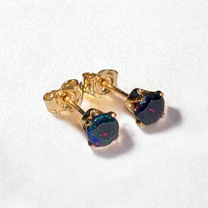 Black opal stud earrings in 14k solid gold, gold filled, or sterling silver — available in white, yellow, or rose gold and sizes 3mm, 4mm, 5mm, 6mm — natural black opal gemstone studs with colorful iridescence, October birthstone jewelry gift.