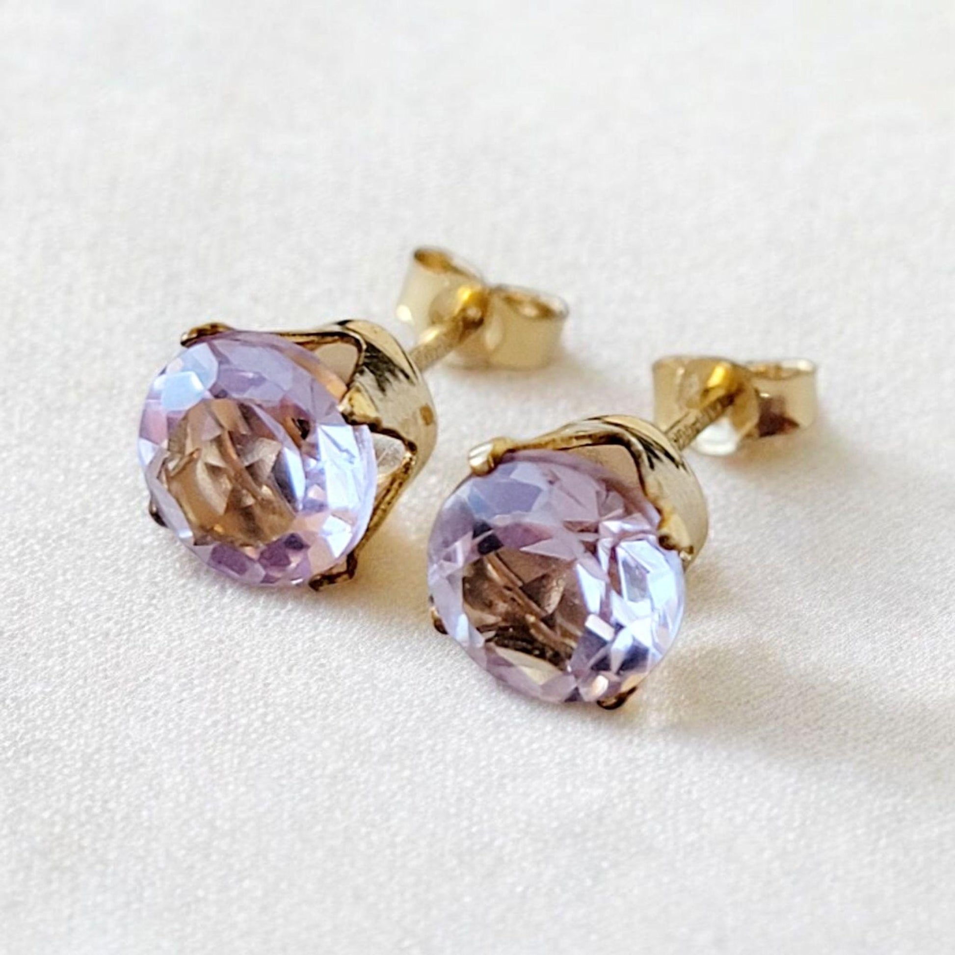 Pink amethyst stud earrings in 14k solid gold, gold filled, or sterling silver, available in 6mm, 5mm, 4mm, and 3mm sizes.