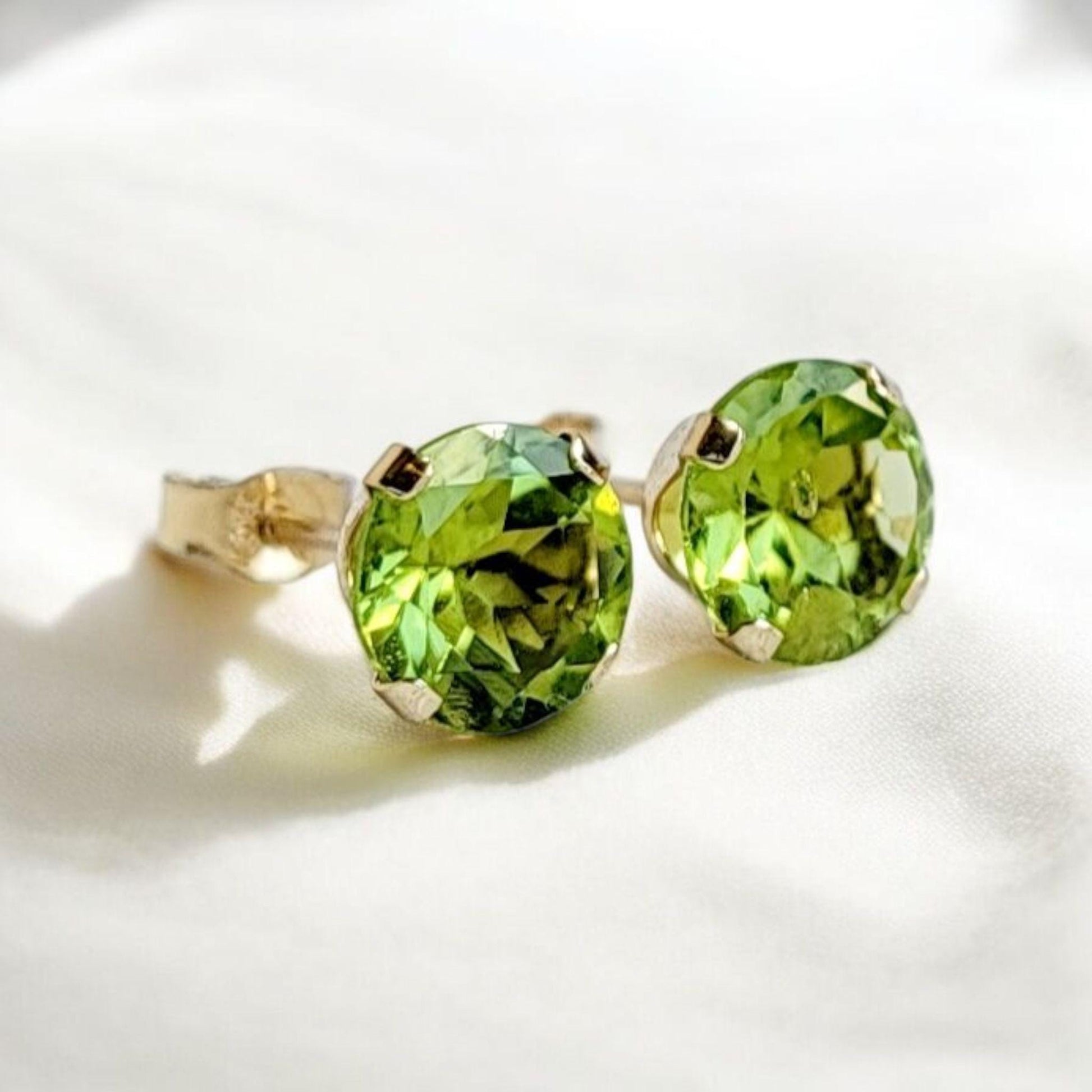 Peridot stud earrings in 14k solid gold, gold filled, or sterling silver — available in white, yellow, or rose gold and sizes 3mm, 4mm, 5mm, 6mm — natural green peridot gemstone studs, August birthstone jewelry gift.
