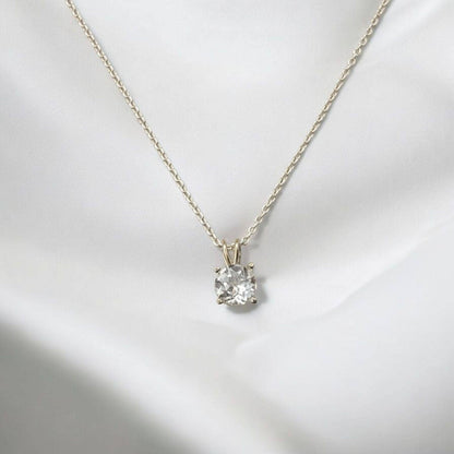 White topaz pendant necklace in 14k gold or sterling silver, available in 6mm–3mm with 16 or 18 inch chain.