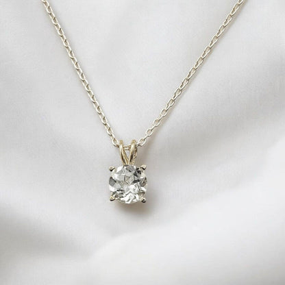 White topaz pendant necklace in 14k gold or sterling silver, available in 6mm–3mm with 16 or 18 inch chain.