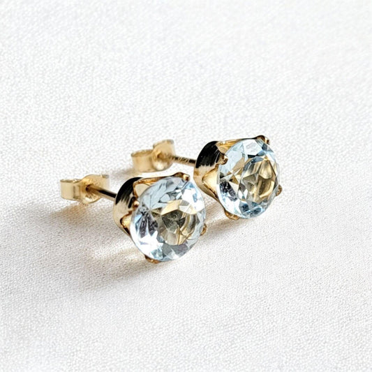 Sky blue topaz stud earrings available in 14k solid gold, gold filled, or sterling silver — choose rose, yellow, or white gold for a timeless natural gemstone style.
