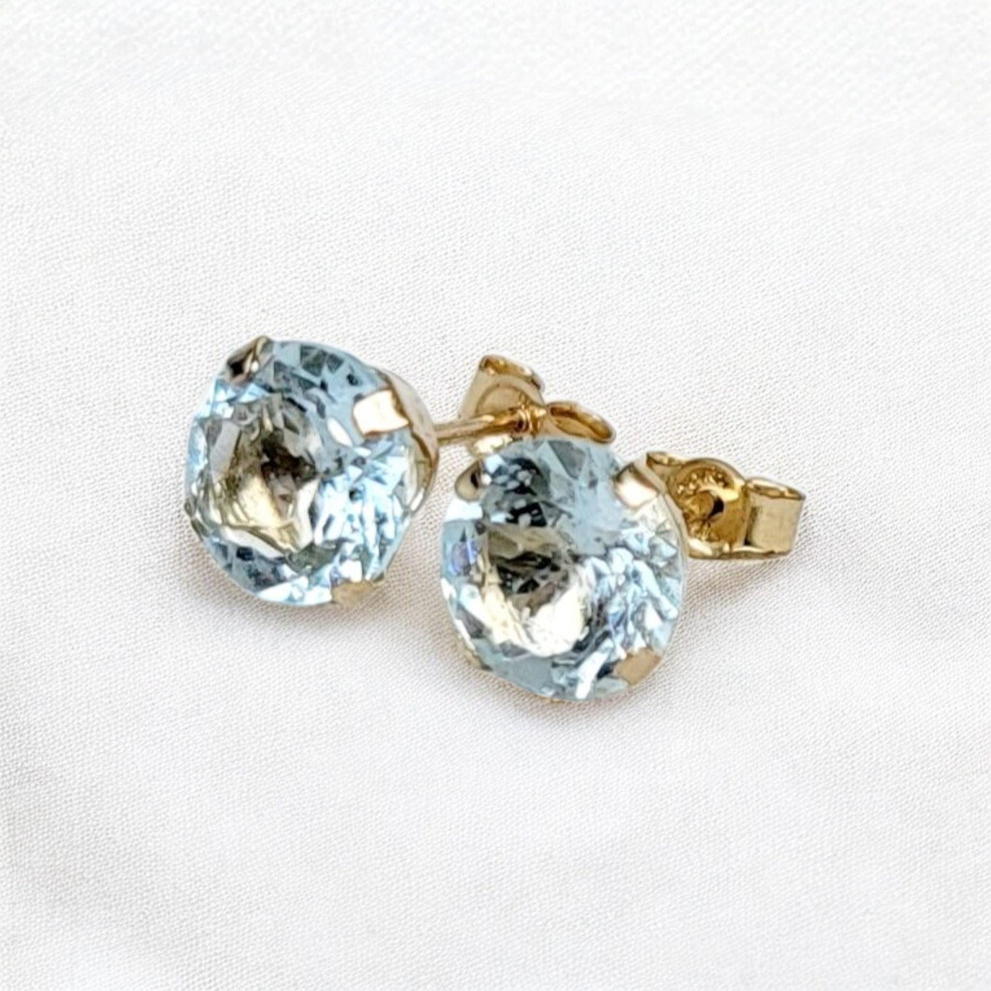 Sky blue topaz stud earrings available in 14k solid gold, gold filled, or sterling silver — choose rose, yellow, or white gold for a timeless natural gemstone style.