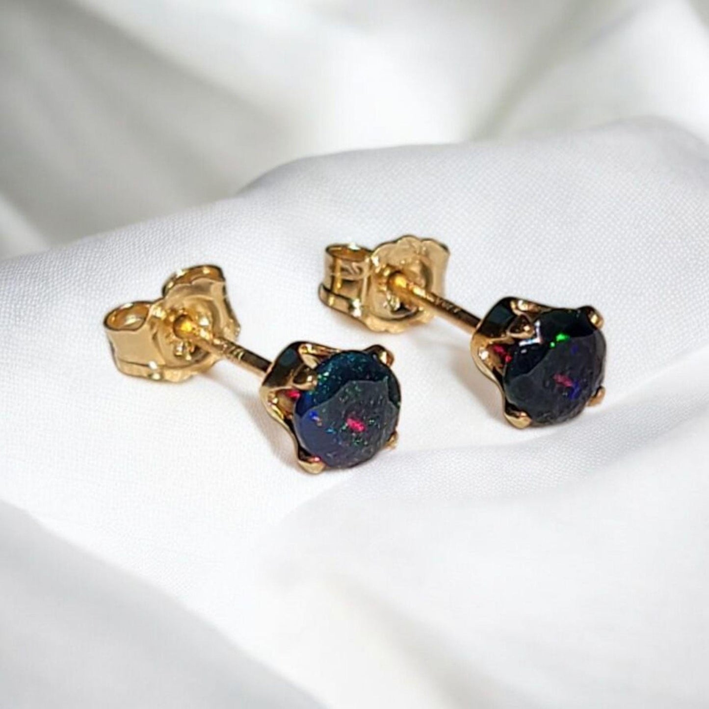 Black opal stud earrings in 14k solid gold, gold filled, or sterling silver — available in white, yellow, or rose gold and sizes 3mm, 4mm, 5mm, 6mm — natural black opal gemstone studs with colorful iridescence, October birthstone jewelry gift.